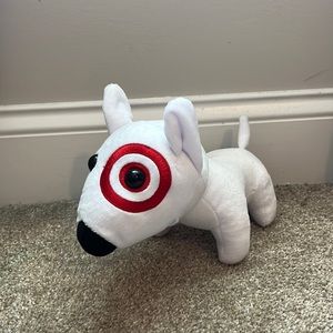 Bullseye target plush dog.
